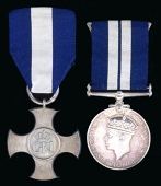The excessively rare Second World War ‘Passage to Tobruk’ D.S.C. and ‘Norway’ D.S.M. group of six awarded to...
