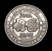 Woolwich and Sandhurst Athletics, obv. twin shields, rev. engraved, ‘C. A. Sykes, 1889’, 51mm., silver, minor...