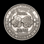 Woolwich and Sandhurst Athletics, obv. twin shields, rev. engraved, ‘C. A. Sykes, 1889’, 51mm., silver, minor...