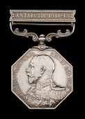 The Polar Medal to Lieutenant-Commander Henry Rennick, Royal Navy, Lieutenant and Hydrographer on Scott’s last...