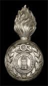 Worcestershire Artillery Volunteers, a very scarce other ranks grenade plume holder in die-stamped white metal, the...