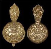 Royal Jersey Artillery Militia, a very fine and rare officer’s grenade plume holder in gilt metal, the ball with...