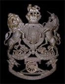 Donegal Militia Artillery, a very rare officer’s copper gilt helmet plate c1889-1900, QVC Royal Arms with cannon...