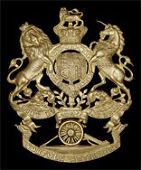 Norfolk Militia Artillery, a fine and rare officer’s copper gilt helmet plate c1889-1900, QVC Royal Arms, cannon...