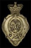 Royal Regiment of Artillery, a very rare other ranks die-cast brass shako plate 1812-16, a crowned rococo plate with...