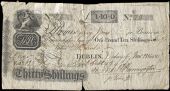 Co Dublin, Dublin, Thirty Shillings, 1 November 1814, no. 20, for Thomas Hannyington, signed by him. Split at centre...