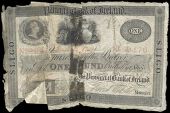 One Pound, January 1831, No. 29476, Sligo (Pick –). Split and rejoined with tape at centre and by paper on left...