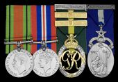 Four: Captain Frederic John Hayward, Gold Coast Defence Force

Defence and War Medals, unnamed; Efficiency...