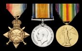 Three: Corporal R. Elliott, Royal Garrison Artillery, late East African Regiment and East African Maxims, being...