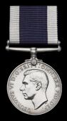 Royal Navy L.S. & G.C., G.VI.R., 1st issue (K. 64677 A. E. Cross, L./Sto., H.M.S. Herald), number officially...