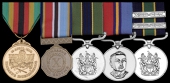 A scarce Rhodesia Police Meritorious Service Medal (P.M.M.) group of five awarded to Detective Sub-Inspector Aroni,...