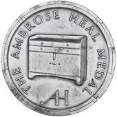 The Worshipful Company of Furniture Makers, Ambrose Heal Medal, c. 1930, a silver award medal, unsigned [by J....