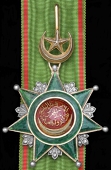 Ottoman Empire, Order of Osmania, 3rd Class neck badge, 57mm., silver, silver-gilt and enamel, with a length of...