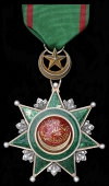 Ottoman Empire, Order of Osmania, 4th/5th Class breast badge, 57mm., silver, silver-gilt and enamel, with ribbon,...