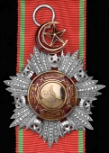 Ottman Empire, Order of Medjidie, 4th Class breast badge, silver, gold and enamel, with Arabic stamp mark and Arabic...