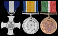 A fine Great War D.S.C. group of three awarded to Second Officer J. Mc D. Dunbar, Mercantile Marine, who was taken...