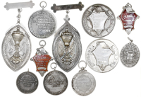 Music, LONDON, The Guildhall School of Music (Est. 1880), silver awards (11), six different designs, viz. a medal by...