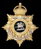 The Buffs (East Kent Regiment) Officer’s Post 1902 Helmet Plate. A crowned eight pointed star with gilt and Garter...