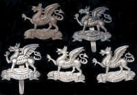 The Buffs (East Kent Regiment) Officers’ Cap Badges. Comprising a fine quality example in H/M silver (Birmingham...