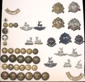 Bedfordshire Regimental Insignia. A carded selection of post 1881 - 1960 items comprising caps, collars, s/titles,...