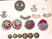 Cornwall Military Insignia. The DCLI comprising a single scarce first pattern collar badge (Churchill 896), a scarce...