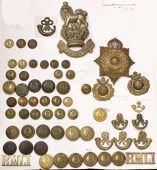 Royal Marines Insignia. Two large carded displays mainly comprising later period buttons and collar badges but...