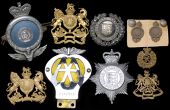 Miscellaneous Insignia. Comprising a rare helmet plate to the Southern Railway Police, a QEC helmet plate to the...