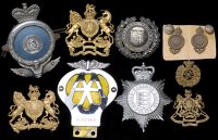 Miscellaneous Insignia. Comprising a rare helmet plate to the Southern Railway Police, a QEC helmet plate to the...