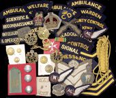 WWI Helmet Plates to the Wurtemburg State and the Austrian Dragoons, British Cloth Insignia. A good die stamped...