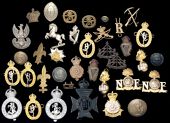 Miscellaneous Military Items. Including a gilt and silver overlay for an officer’s helmet plate to the South...