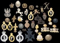 Miscellaneous Military Items. Including a gilt and silver overlay for an officer’s helmet plate to the South...