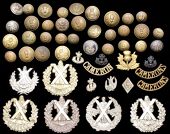 Cameron Highlanders and the Essex Regiment Insignia. The former comprises four post 1892 glengarry badges, Piper’s...