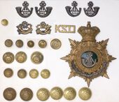 The King’s Shropshire Light Infantry Insignia. Comprising an officer’s QVC helmet plate featuring a silver...