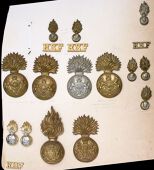 Royal Scots Fusiliers Insignia. A good selection of items including an o/r QVC fur cap grenade and corresponding...
