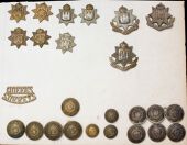 31st/70th/The East Surrey Regiment Insignia. Comprising o/r glengarry badges to the 31st (KK 474) and the 70th (KK...
