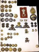Lancashire Fusiliers Insignia. A good selection including an officer’s fur cap grenade in gilt with silver mounts,...