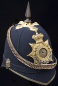 Northamptonshire Regiment an Officer’s Blue Cloth Helmet. A standard example complete with all gilt metal...