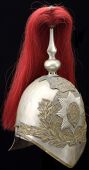 The Life Guards a Trooper’s 1871 Pattern Helmet. White metal skull overlaid with brass oak leaf and scallop shell...