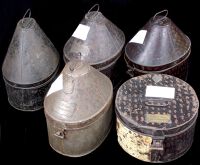 Helmet and Hat Tins. Comprising two named tins for cavalry helmets, RGM Newton Esq., Queen’s Bays and A Gallaher...