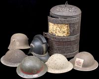 Steel Helmets. Comprising four British examples (one a relic and lacking all lining etc.,), one with painted badges...