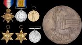 Family group:

Three: Private F. F. B. Thomas, Royal Army Service Corps, late Royal Field Artillery, who died on...