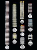 Naval Good Shooting Medal, G.V.R., 36 clasps, H.M.S. “Africa” 1910 12” B.L., H.M.S. “Britannia” 1910 6”...