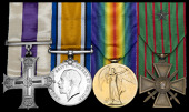 A Great War M.C. group of four awarded to Captain E. J. Dickinson, Canadian Army Medical Corps, attached to the 1st...