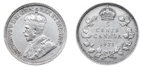 Canada, George V, 5 Cents, 1921 (KM. 22a). Lightly cleaned at some time, otherwise good very fine and very rare
...
