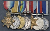 Seven: Engine Room Artificer Class 1 R. J. Keating, Royal Navy

1914-15 Star (M.13499 Act. E.R.A.4, R.N.); British...