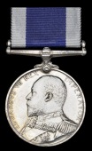 The Long Service medal awarded to Chief Engine Room Artificer H. S. Read, Royal Navy, killed in action aboard H.M.S....