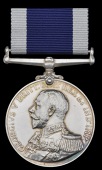 The Long Service medal awarded to Artificer Engineer F. Carter, Royal Navy, who was killed aboard H.M.S. Bulwark...