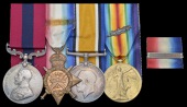 A Great War D.C.M. group of three awarded to Temporary Warrant Officer Class 1 A. E. Laurence, 9th (Service)...