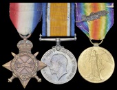 Three: Commander C. B. Hampshire, Royal Navy, who was wounded by a bullet whilst serving in the Dardanelles on 23...