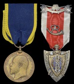 An Edward Medal for Mines in Bronze awarded to Dr. E. A. Dando, for his gallantry in saving life at the Russell Hall...